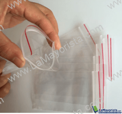 Bolsa con cierre hermético (raya roja) transparente 19.5x38cm. Calibre delgado 0.4 especial