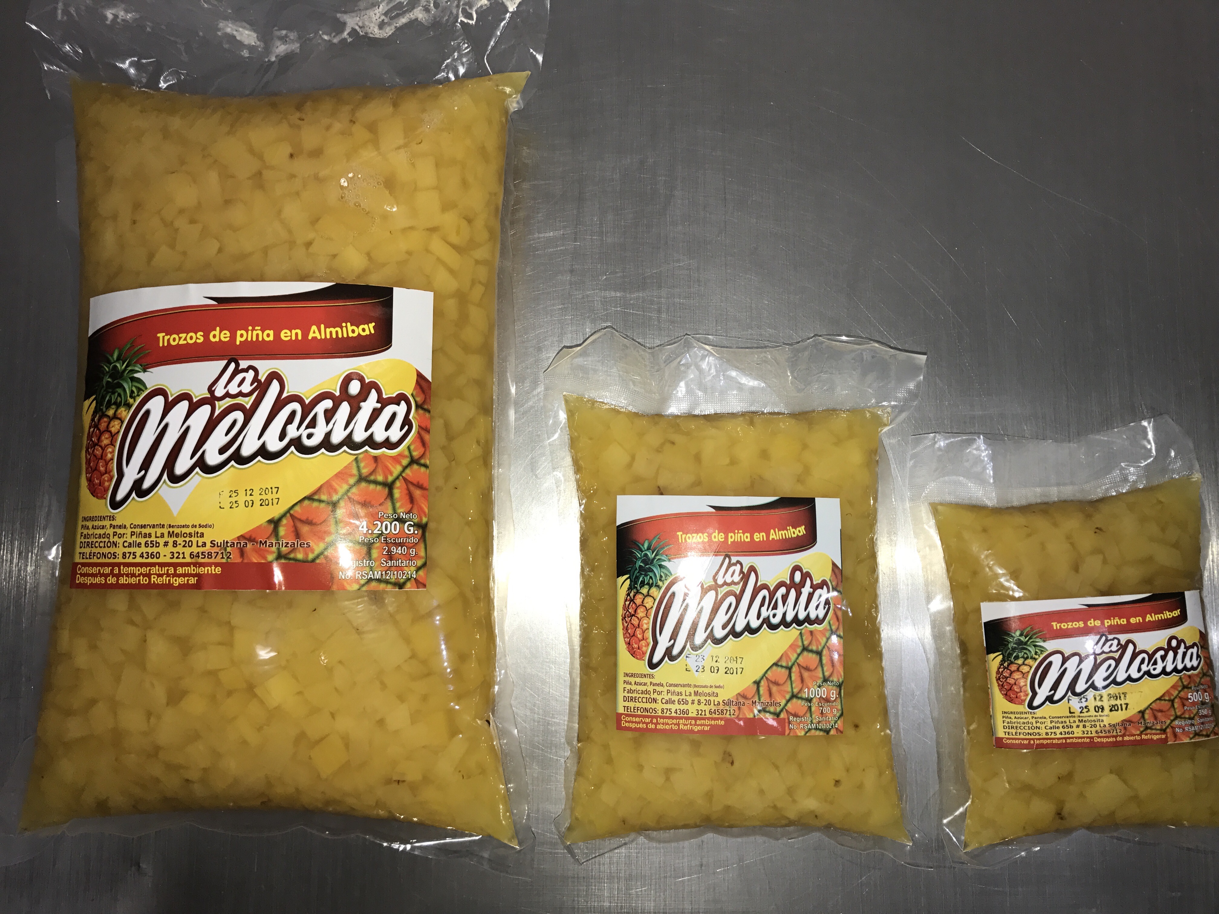 Trozos de piña en almíbar ( piñas la melósita )