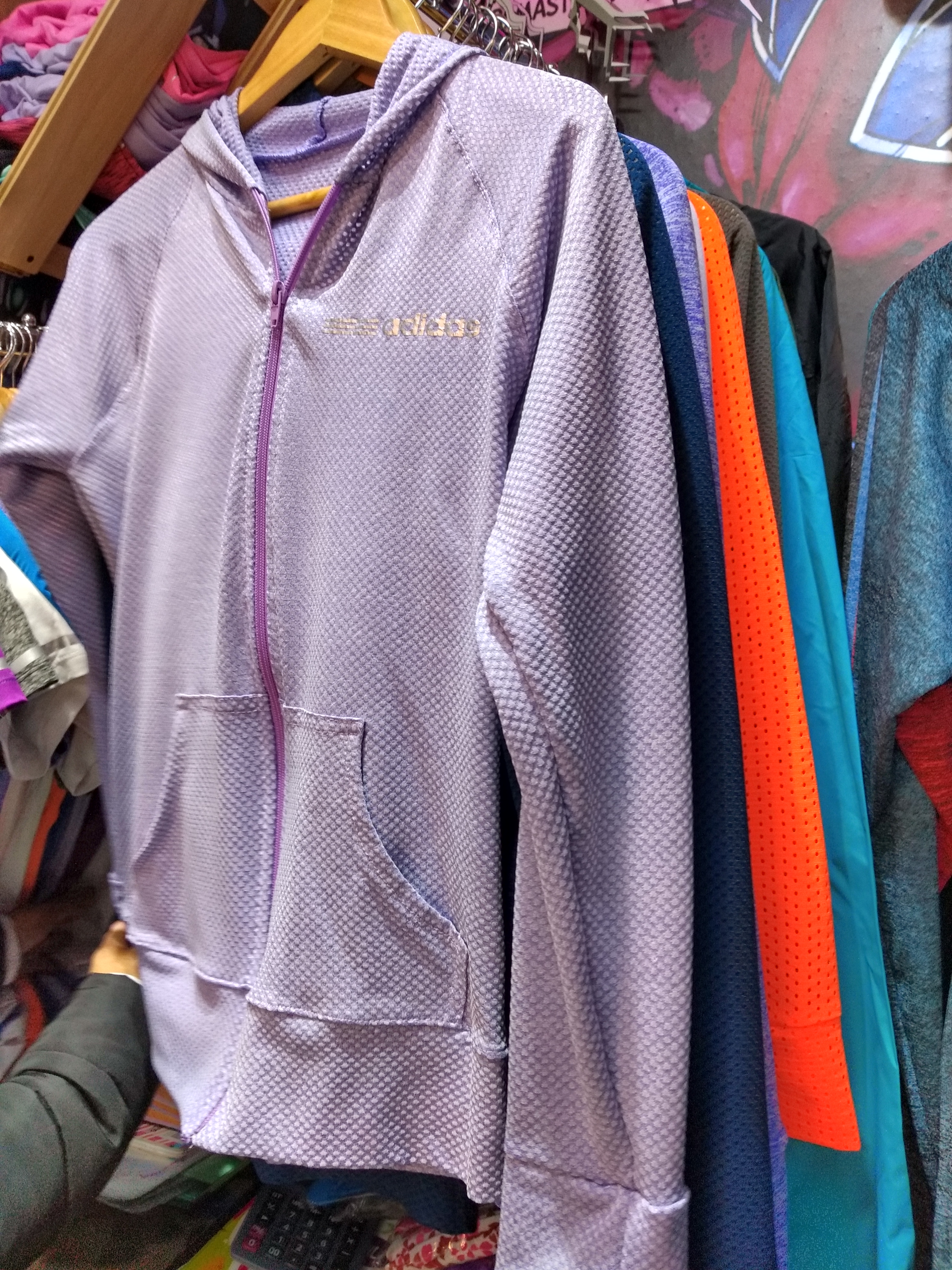 Chaqueta en malla deportiva para dama