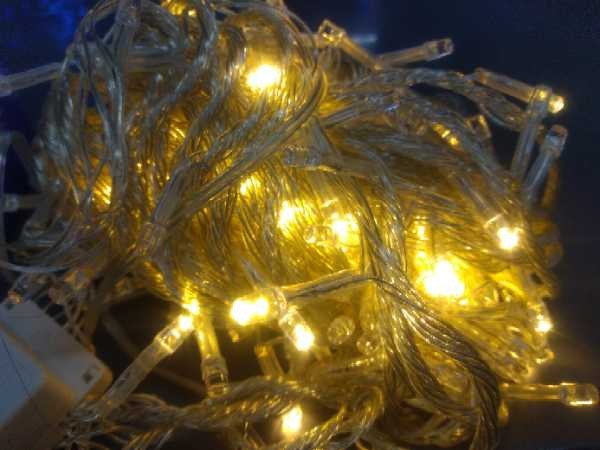 LUZ LINEAL x 100 BOMBILLOS-CABLE TRANSP Color:AMARILLO